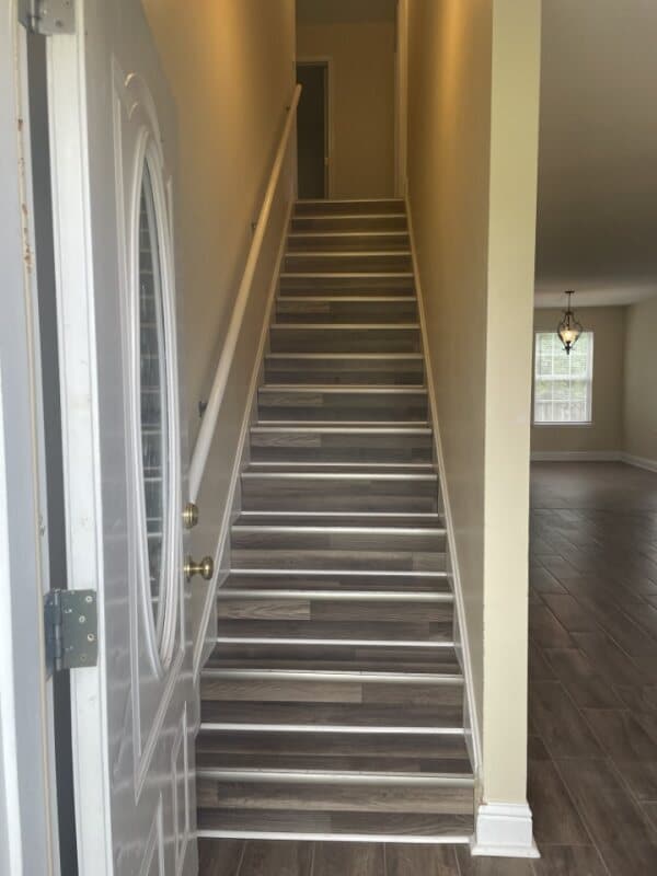 Stairway to second floor. - 10323 Daisy Vestry Rd