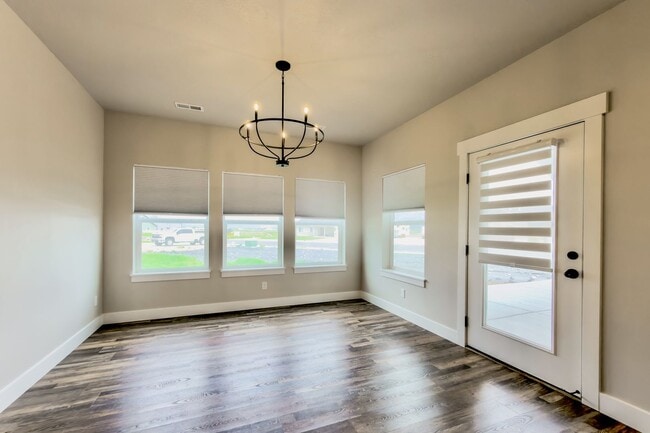 Photo - Spacious 3 Bed, 3 Bath Pet-Friendly Home with Oversized 3+ Car Garage! - Available NOW!