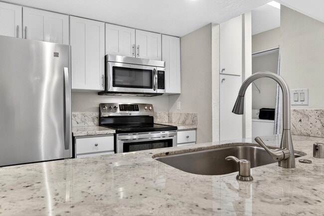 Photo - Updated Ground-Floor End Unit with Pool Access & No Stairs in West Roundtree! Unidad A
