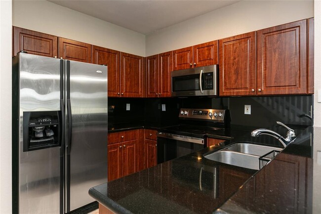Building Photo - 4408 Woodland Cir Rental