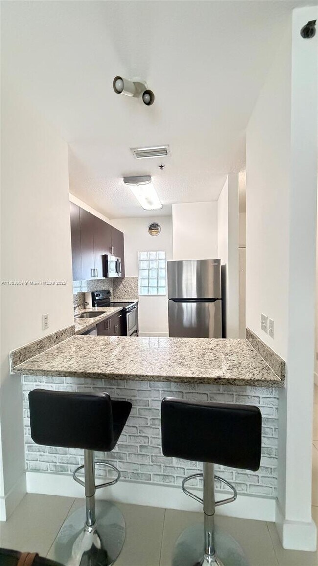 Photo - 695 SW 11th St Unit 302