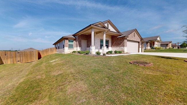 Photo - Discover this spacious 4-bedroom, 2-bath home with 3 CAR GARAGE!!!