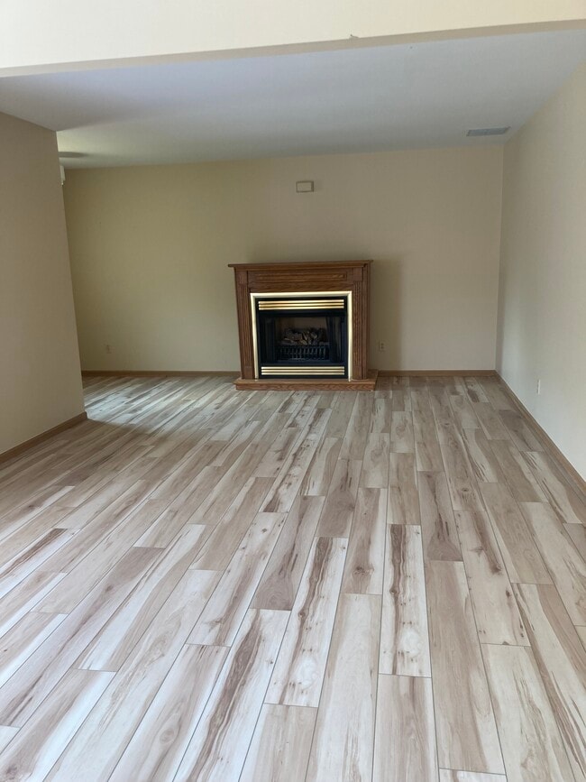 Living Room w/Gas Fireplace - 412 11th Cir SE Unit Iron Lake Estates