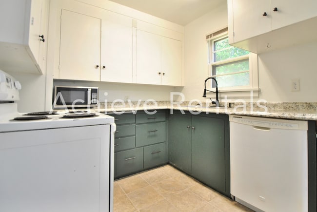 Photo - Covered Patio, Garage & Yard – Your Next Logan Home Awaits