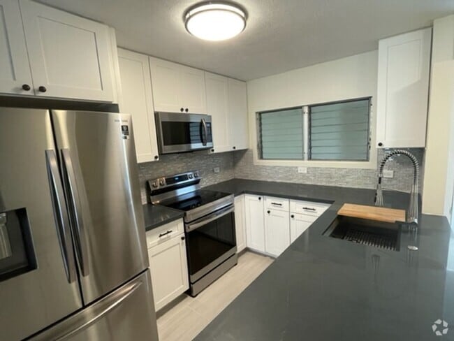 Building Photo - Available now - 2 bedroom / 2 bath / 1 cov... Rental