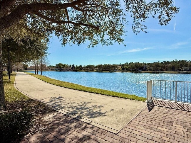 Photo - Gorgeous 3/2 Mediterranean Villa with Waterfront Screened Patio and 2-Car Garage in the Prestigio...