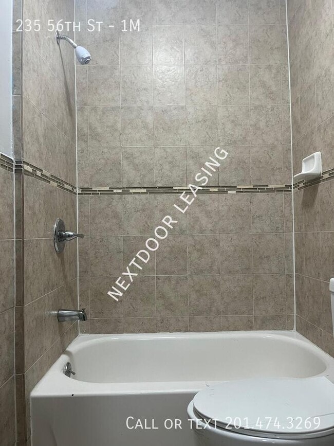 Photo - 235 56th St Unidad 1M