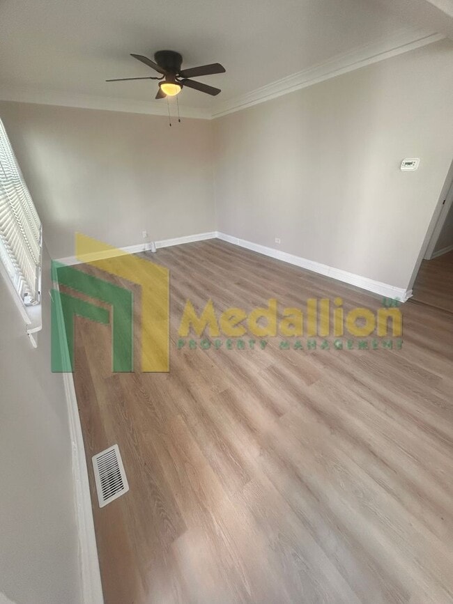 Photo - Spacious 1-Bedroom Single-Family Home with Large Fenced Yard