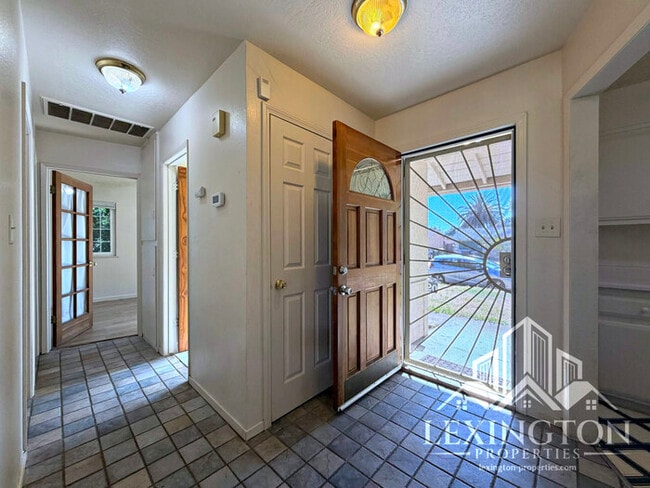 Photo - Charming 4-Bedroom Home in Arden-Arcade with Spacious Yard & Convenient Location