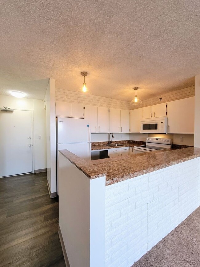 Photo - Available now | 1 bed, 1 bath mid-floor condo with open mountains views at Pearl Regency Unit 1213