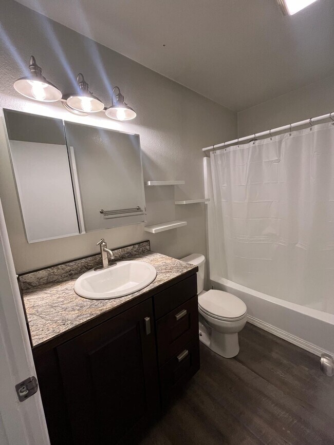 Bathroom tub, shower - 1230 6th St W Unit #2 Two Bedroom