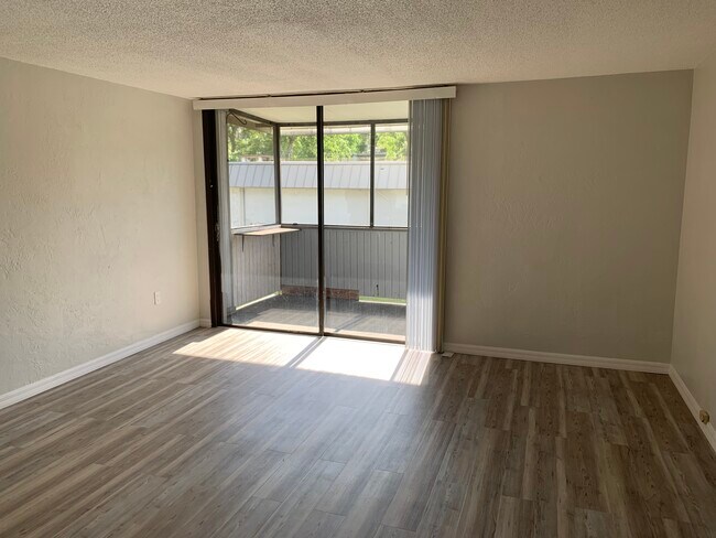 Primary bedroom with screened in balcony - 609 SW 75th St Unit 201
