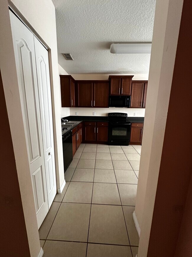 Photo - 3909 Flowering Orchid Ln