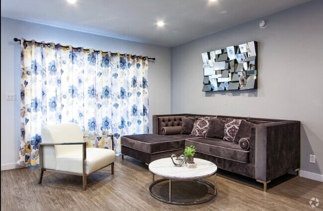 Living Room with Double paned balcony doors - The Runyon Rental