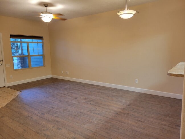 Living and dining areas - 5775 W 29th St Condo Unit not given
