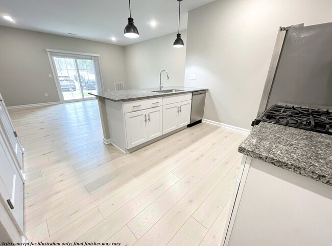 Open Concept Kitchen & Living Room - Howard Meadow Apartment Homes