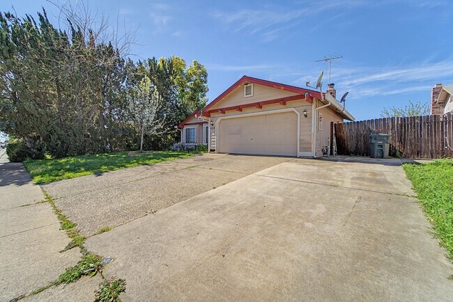 Photo - Freshly Updated 4-Bedroom Home with Central A/C & Garage