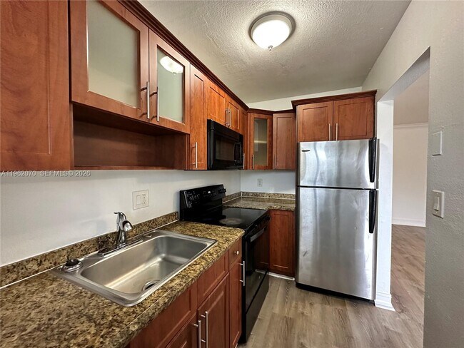 Photo - 1400 NE 56th St Unidad 310