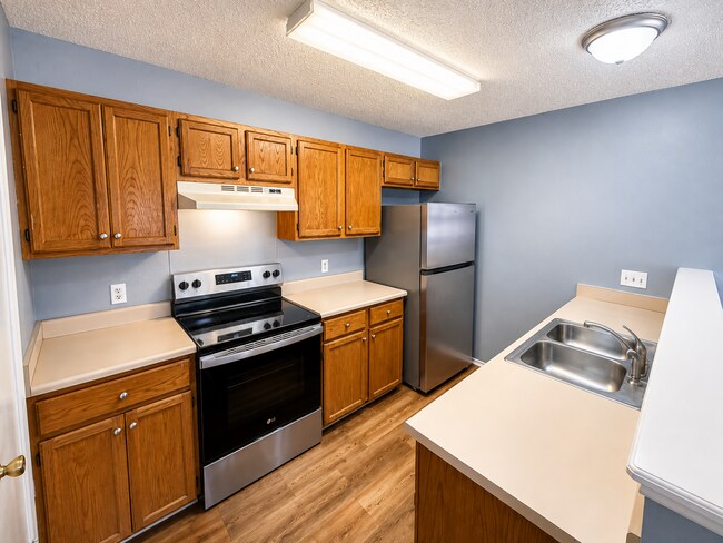 Photo - Move-In Ready 3BR/2BA: Updated Kitchen, New Light Fixtures & Fenced Yard