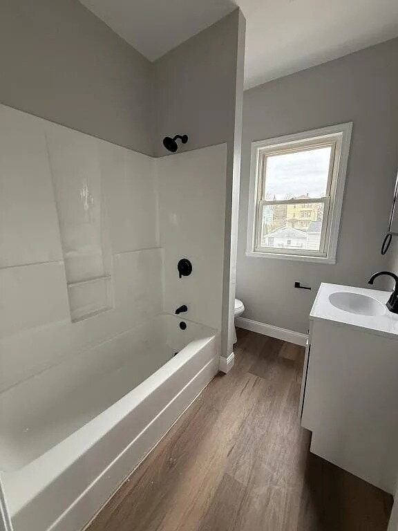 Photo - This stunning apartment on the 3rd floor boasts 3 bedrooms, 1 bathroom.