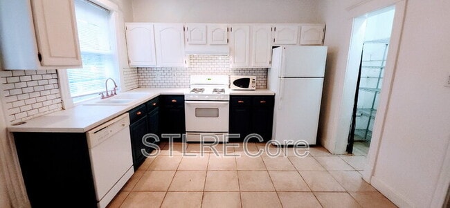 Building Photo - 6009 Kingsbury Ave Unit 1st fl