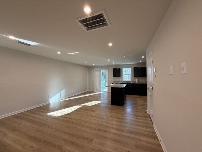 Photo - Modern 3-Bedroom Townhouse with Garage & Private Patio