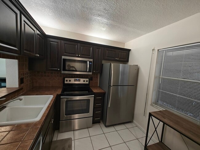 Photo - 8750 Royal Palm Blvd Unit 111