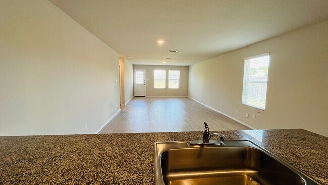 Photo - Spacious 4BR w/ Large Backyard – Close to ...