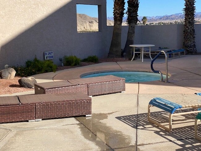 Photo - Waterfront 2BR 2B Condo Lower Level, gated with tennis,pool,spa,PRIVATE BEACH/DOCK Unit A103