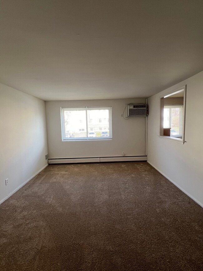 Sala de estar - Arrowhead Court Apartments