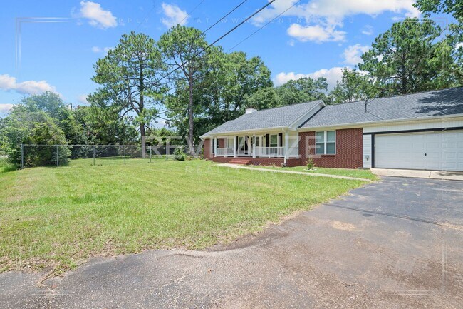 Photo - Beautifully Updated 3-Bedroom Home with Fenced Yard & Double Garage!