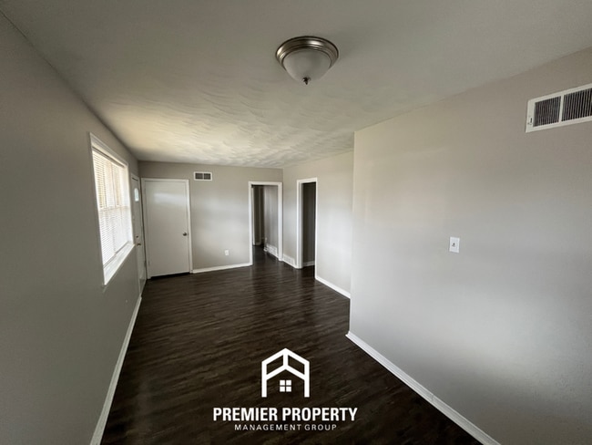 Photo - Spacious 4-Bedroom Memphis Home with Brick Fireplace & Fenced Backyard