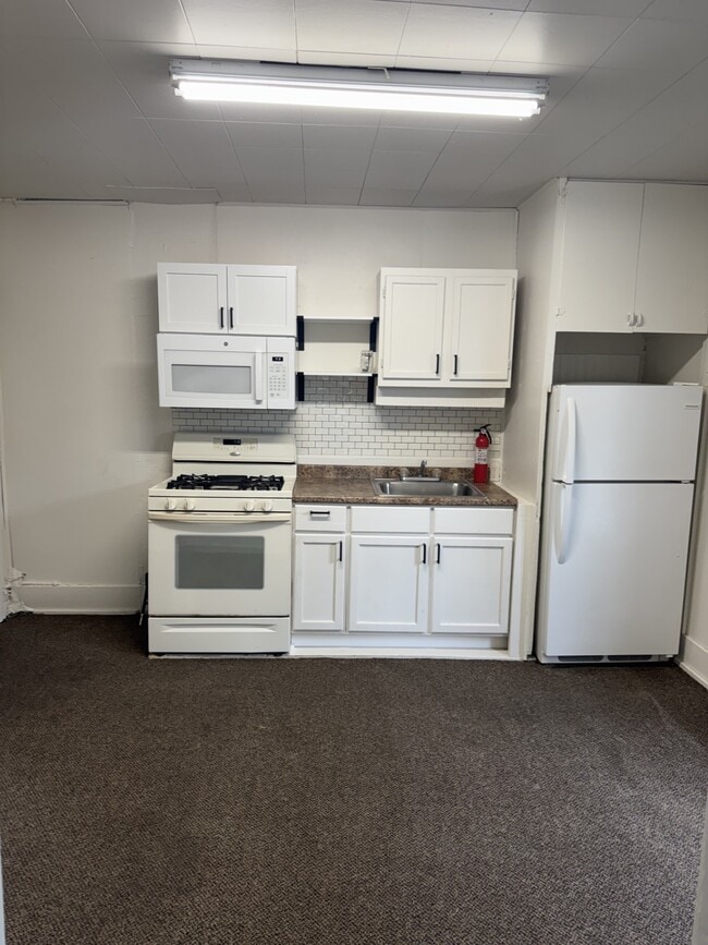 Building Photo - 102 2nd Ave NE Unit LF 7