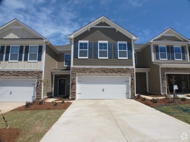 Building Photo - Beautiful Move In-Ready Townhome located i...