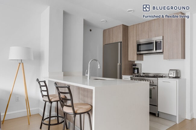 Photo - 311 W 50th St Unit FL6-ID228