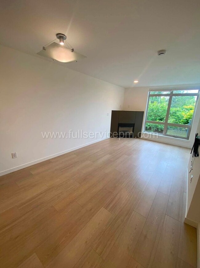 Photo - Modern Queen Anne Townhome w/ Dedicated Office, Fenced Patio, Lofted Primary Suite & Oversized Ga...
