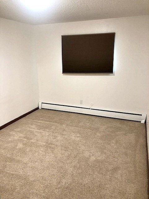 Photo - Spacious Two-Bedroom Condo with Private Deck