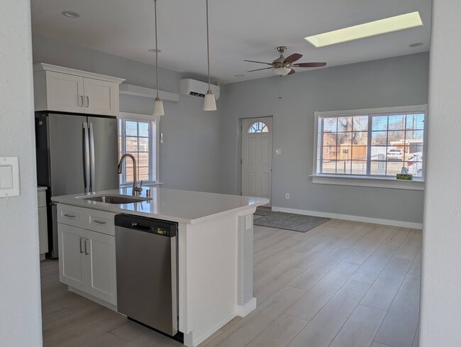 Open concept living room - 1020 Headingly Ave NW
