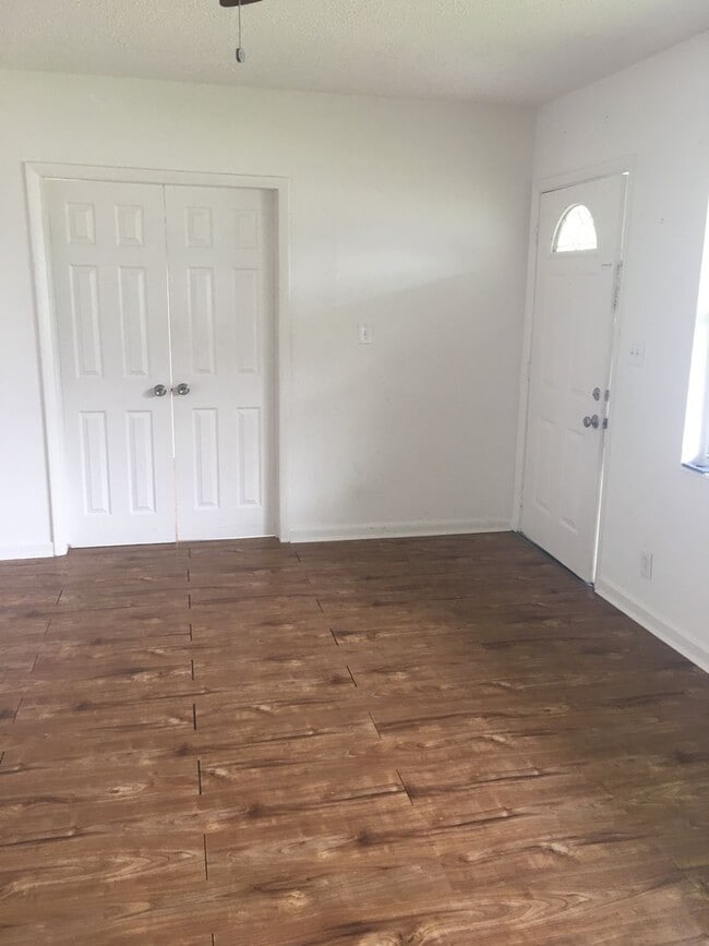 Photo - Spacious 4BR Home with Fenced Yard, Screened Patio & Updated Interior – 1,354 Sq Ft