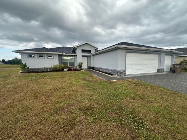 Building Photo - NE Cape Coral- Gator Circle Home- 4 Bedroom 2 Bathrooms 3 Car Garage