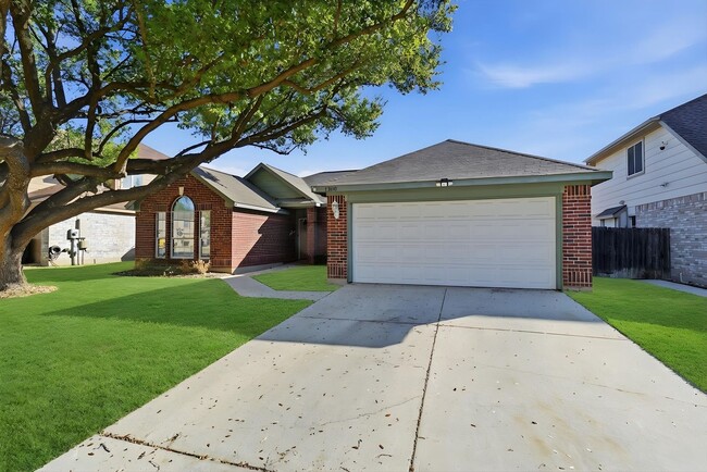 Photo - Vaulted Ceilings, Stone Fireplace & Updated Baths!