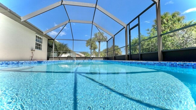 Photo - 3 BR , 2 Bath Annual Screened Pool Home Available