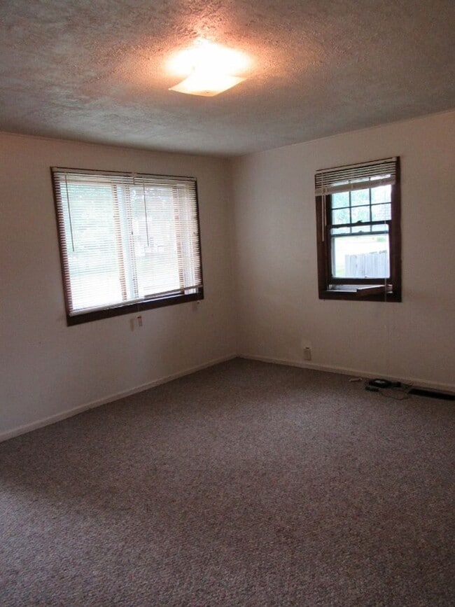 Photo - 3 bedroom, 1 bath. Large yard with large storage shed.