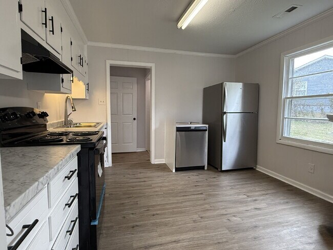Photo - Section 8 Welcome!!! "Charming 4-Bedroom Home in Huntsville's Heart - 1,419 Sq. Ft. of Comfort!"