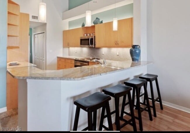 Building Photo - 4650 Yacht Harbor Dr Unit 132