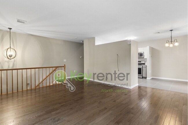 Photo - Spacious 2BR/2BA Duplex in Gated Community with Parking, Washer/Dryer & NYC Skyline Views