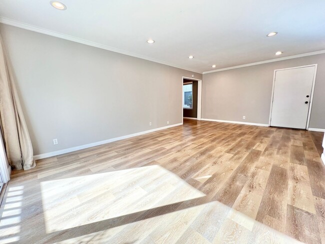 Photo - Contemporary 2 Bed Condo with 2 Garage Parking Spaces, Community Pool, and 3 Private Balconies