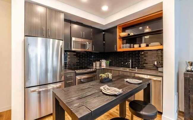 Counter on both sides of the gas range gives prep space where you need it.