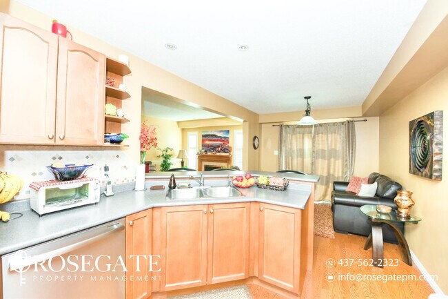 Photo - Spacious 3-Bedroom + Den, 1.5-Bath Home in... Unit 1