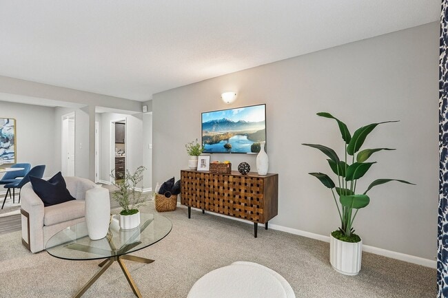 Spacious living room with carpet
